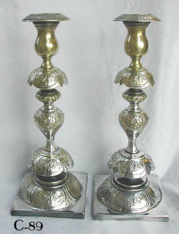 Pair of Petticoat Style Polish Candlesticks