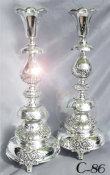 Pair of Ornate Petticoat Style Candlesticks